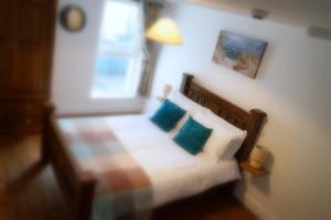 Ένα ή περισσότερα κρεβάτια σε δωμάτιο στο Mulranny House