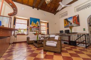 a living room with a checkered floor at Hotel 3 Banderas in Cartagena de Indias