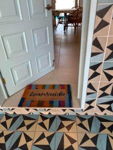 aoyer with a door with a rug on the floor at Casa Rita! Relaxing two bedroom getaway! in Puerto Escondido +37 photos