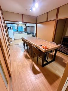 a large dining room with a table and chairs at 8 Guests Entire Private House in Gifu