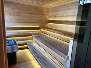 an empty sauna with a wooden at Bocks Apartments 53C in Wald am Arlberg