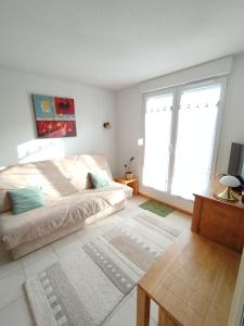 a bedroom with a bed and a large window at Chez Swan et Yuliya in Mooslargue +19 photos