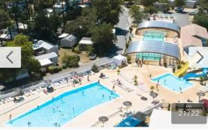 an overhead view of a large swimming pool at La Cabane de Nell in Lège-Cap-Ferret