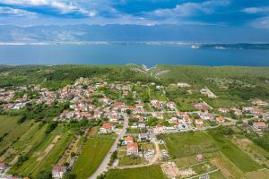 an aerial view of a town next to the water at Eda in Vrsi