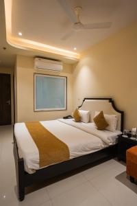 a bedroom with a large bed in a room at Yashvrinda in Mandor +73 photos