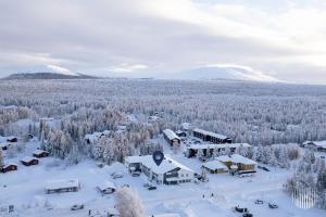 an aerial view of a resort in the snow at Sivulantie 4 109 by Holiday in Lapland in Äkäslompolo +14 photos