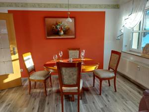 a dining room with a table and chairs at Apartment Erzgebirgsperle in Schwarzenberg