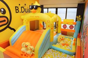 a childs bedroom with a play set with toy animals at Naughty Castle Playground & Ball Pool in Johor Bahru