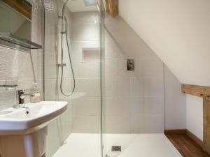 a bathroom with a shower and a sink at 3 Bed in Worcester oc-41983 in Broadwas +10 photos