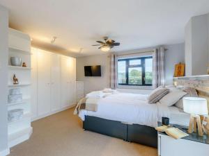 a bedroom with a large bed and a window at 2 Bed in Northwich oc-85877 in Kingsley