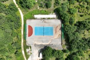 an aerial view of a building with a tennis court at Demare in Gospić