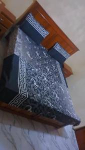 a box sitting on top of a table at Secka Apartment in Sukuta
