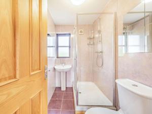 a bathroom with a shower and a toilet and a sink at 3 Bed in Berwick-upon-tweed oc-87777 in Lamberton +19 photos