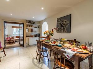 a dining room with a table with food on it at 3 Bed in Bath oc-skn21 in Wellow +20 photos