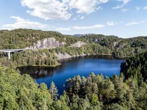 a view of a lake with a bridge over it at Fosseland Hytter in Feda