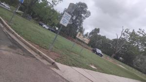 a street sign on the side of a road at Apartment in Gungahlin
