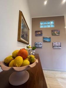 a bowl of fruit on a counter in a room at Antiche mura in Palermo