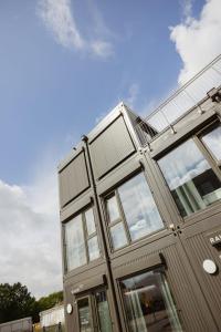 a building with windows on the side of it at HYGGE HOMES - Apartment 'silva' in Winsen
