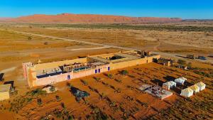 an aerial view of a building in the desert at Ouzina Desert Camp in Ouzina