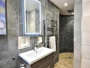 a bathroom with a sink and a shower at 6 Bed in Otley oc-g0022 in Fewston +20 photos