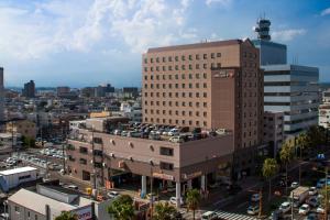 an overhead view of a city with a tall building at Hotel JAL City Miyazaki in Miyazaki