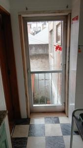 a window in a room with a view of a building at VILLAGE SINTRA gh in Sintra