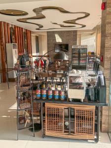 a kitchen with a counter with lots of food at Cresebo Mansion in Tagbilaran City