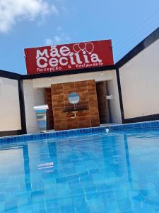 a view of a swimming pool at a hotel at Espaço Mãe Cecília in Paripueira
