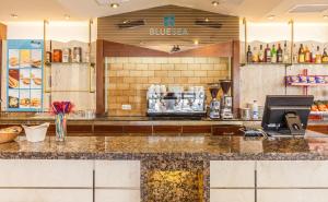 a counter in a restaurant with a counter top at BLUESEA Montevista Hawai in Lloret de Mar +10 photos