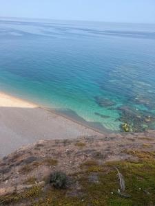 an aerial view of a beach and the ocean at Darnamed in Nador +19 photos