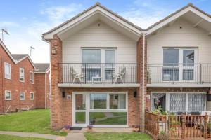 an image of a house with a balcony at 3 Bed in Corton oc-s32347 in Corton