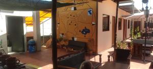 a room with a map on the side of a building at Peter's Hostel in Arequipa