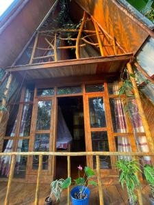 an outside view of a house with windows at Ella Rock Lodge in Ella