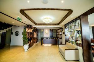a lobby with a couch and a table in a building at Best Western Dalhousie in Dalhousie