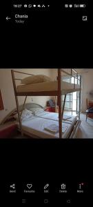 a picture of a bunk bed in a room at Constantinos Budget Beds in Chania