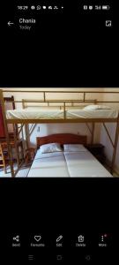 two bunk beds sitting next to each other at Constantinos Budget Beds in Chania