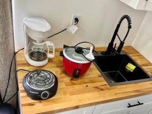 a kitchen counter with a blender and a toaster at Comfy and Relaxed in Cutler Bay