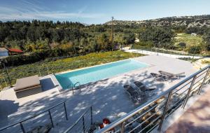 a swimming pool on top of a house at Villa Sofia Almyrida in Almyrida