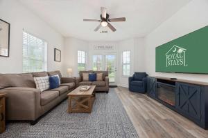 a living room with a couch and a tv at Myrtle Golf Escape At Legends-Pool-Pet Friendly in Myrtle Beach +44 photos