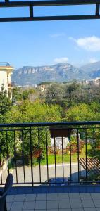 a balcony with a view of the mountains at Casa Aristide in Sant'Agnello