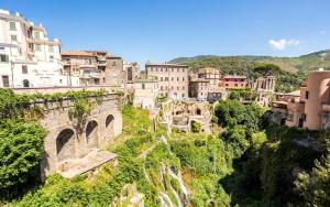 an overview of a city with buildings on a mountain at La Corte di GreSi in Tivoli