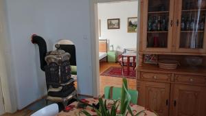 a living room with a table and a dining room at Vila Jitka in České Budějovice