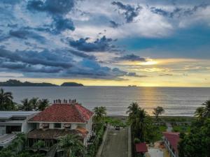 a view of the ocean from a resort at Parti Gras Hotel & Villas en Playa Potrero in Potrero