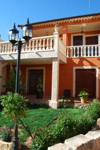 a house with a street light in front of it at Casanavalon in El Peral