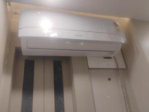a printer sitting on a shelf in a room at Vihangam vatika in Sasarām