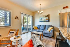a living room with a couch and a table at Ski Getaway! Mtn-View Condo Near Keystone Resort in Keystone