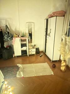 a room with a bedroom with a bed and a mirror at Baraka in Cairo +5 photos