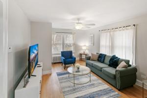 a living room with a couch and a table at USS Russell in Highwood