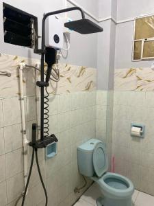 a camera in a bathroom with a toilet at AJM Iligan Homestay in Saray +20 photos