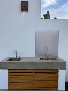 a bathroom with a sink and a counter at Casa Abora - Ocean Views, Private Pool & Sunsets in La Pared +17 photos